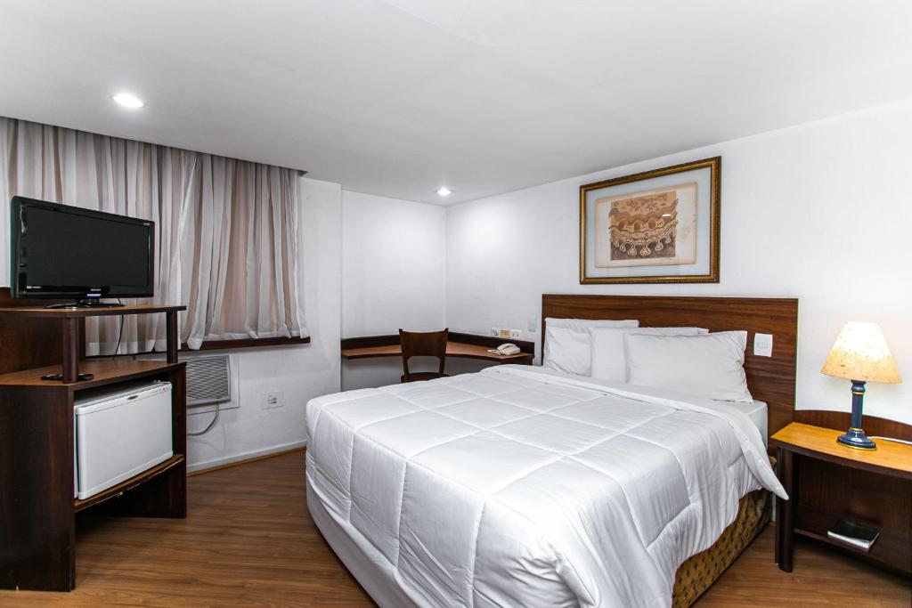 Quarto Single – Hotel Dan Inn