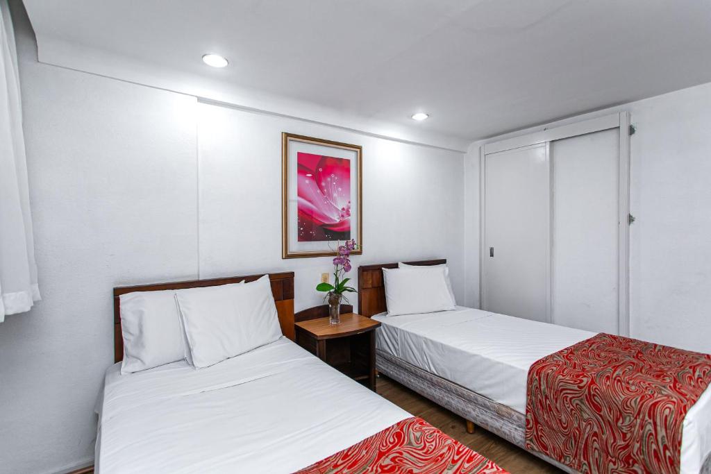 Quarto Duplo Solteiro – Hotel Dan Inn