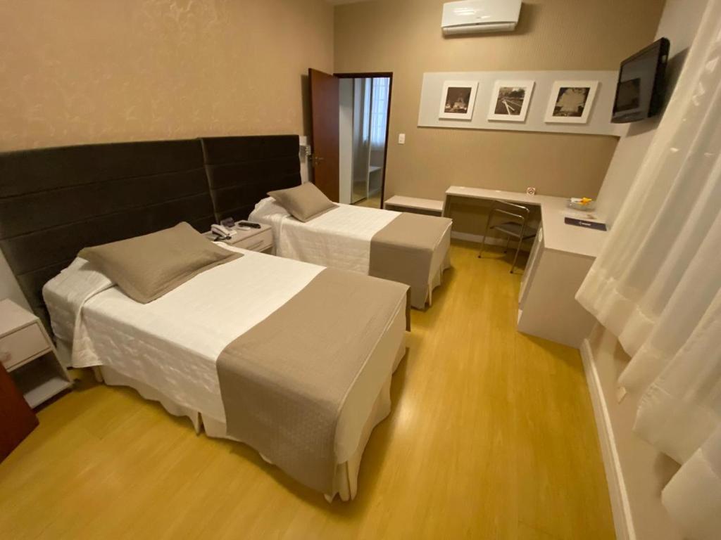 Luxo Duplo Solteiro – Curitiba Palace Hotel