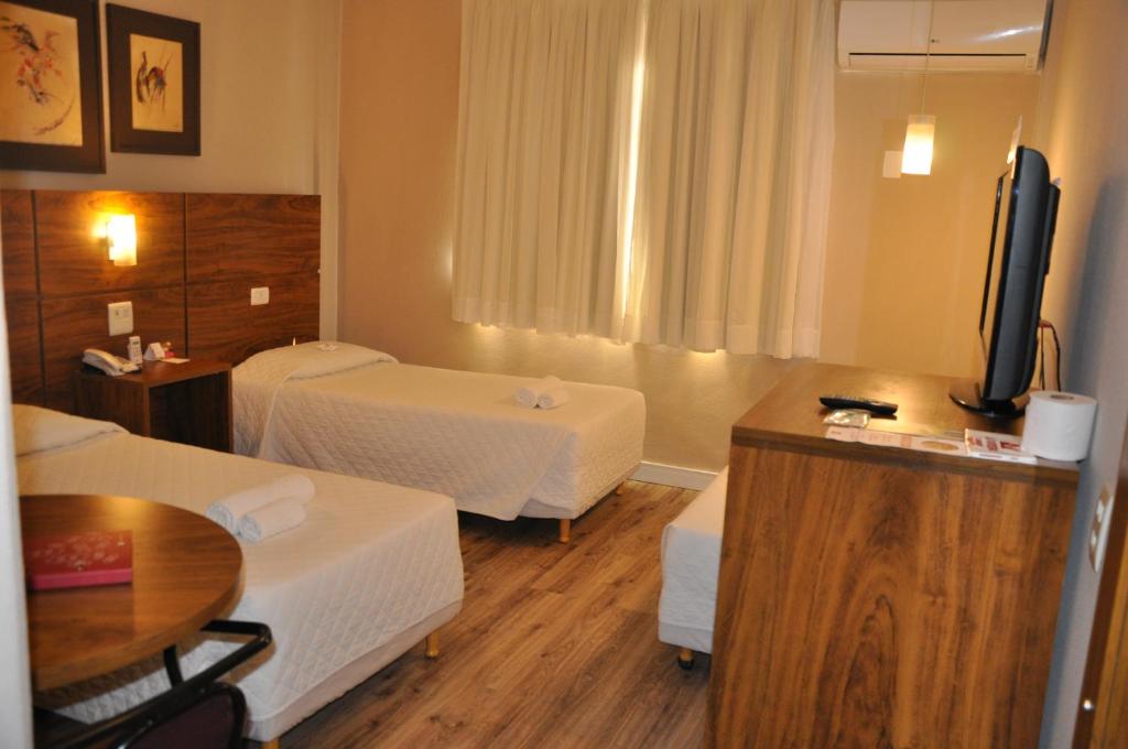 Suíte Standard Duplo Solteiro – San Juan Executive Curitiba