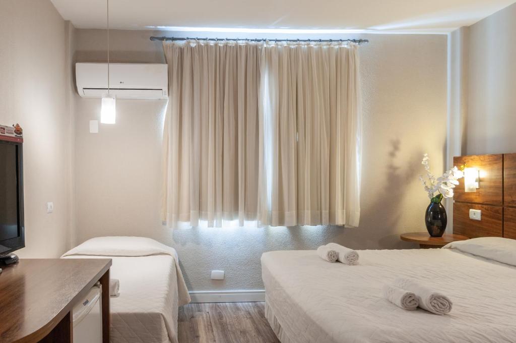 Suíte Standard Triplo – San Juan Executive Curitiba