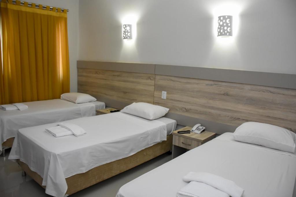 Apartamento Triplo Solteiro – Muffato Plaza Hotel